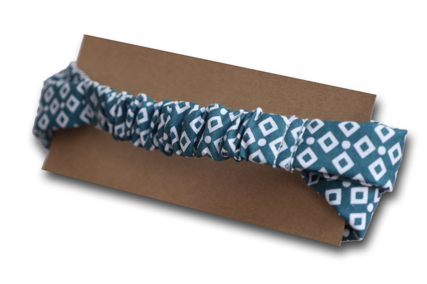 Headband bandeau cheveux élastiqué twisté tissu graphique losanges sur fond bleu vert