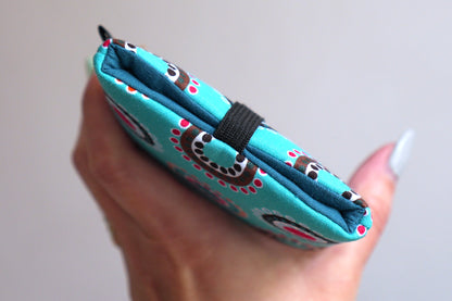 Housse chaussette tous téléphones tissu graphiques ronds sur fond turquoise taille au choix étui portable élastique noir