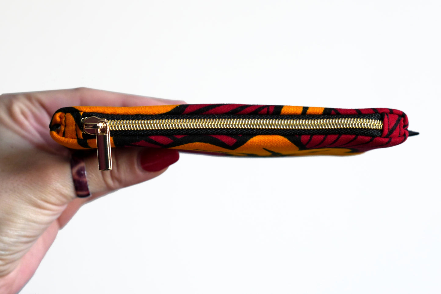 Porte-monnaie format carte identité en tissu wax fleurs de mariage rouge et orange